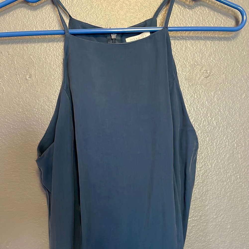 Beautiful blue romper with pockets. Size XS.
